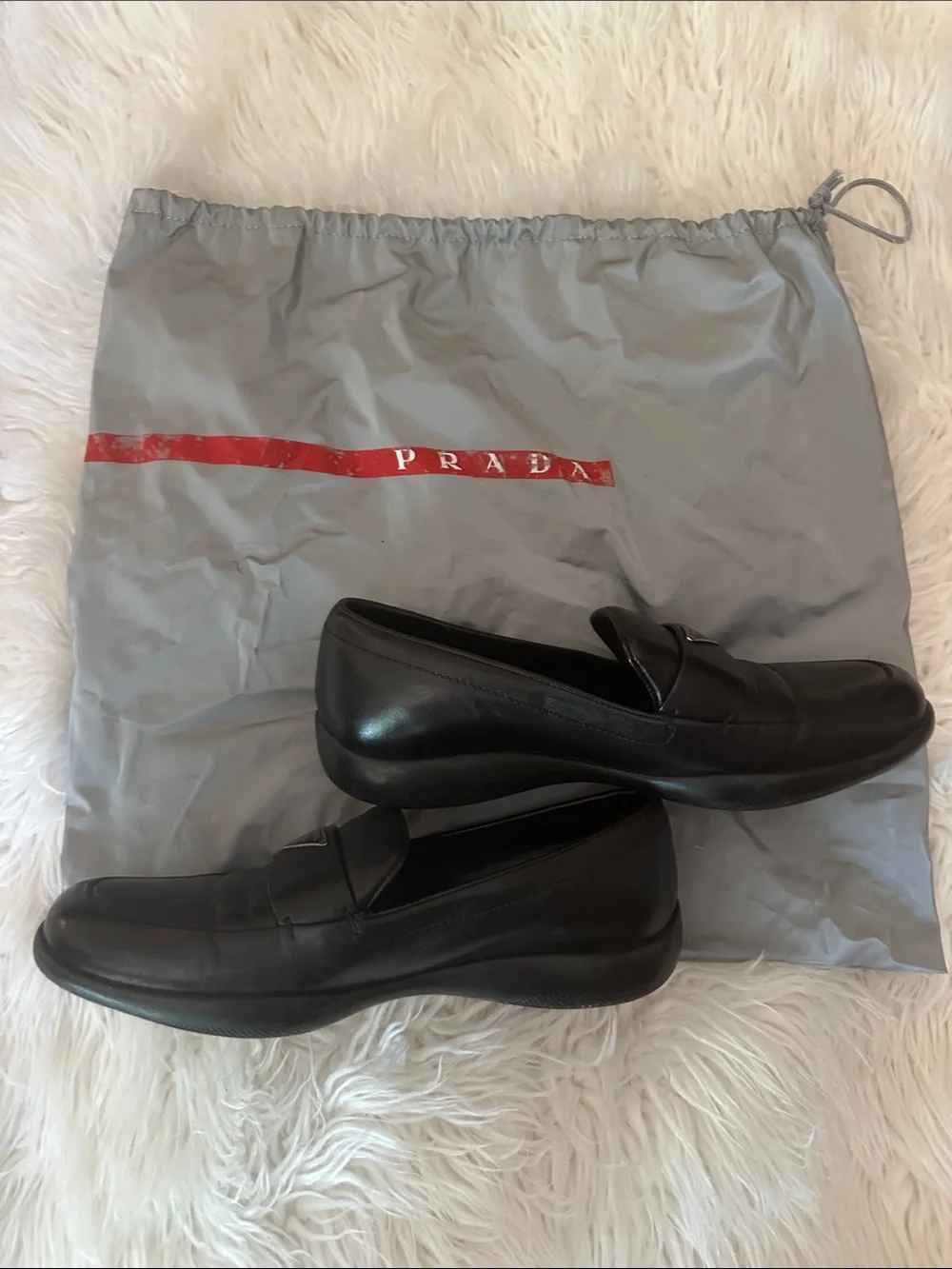 Prada Black Leather Slip-On Loafers with Triangular Logo